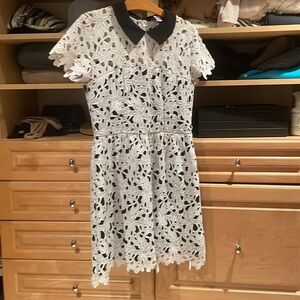 Lace dress by Aqua-L. Fresh from the dry cleaners.